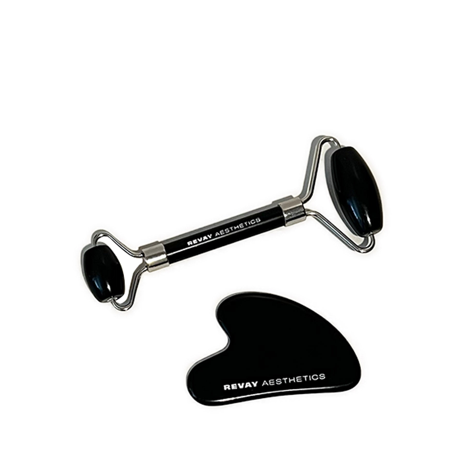 black obsidian gua sha and roller product shot flat lay