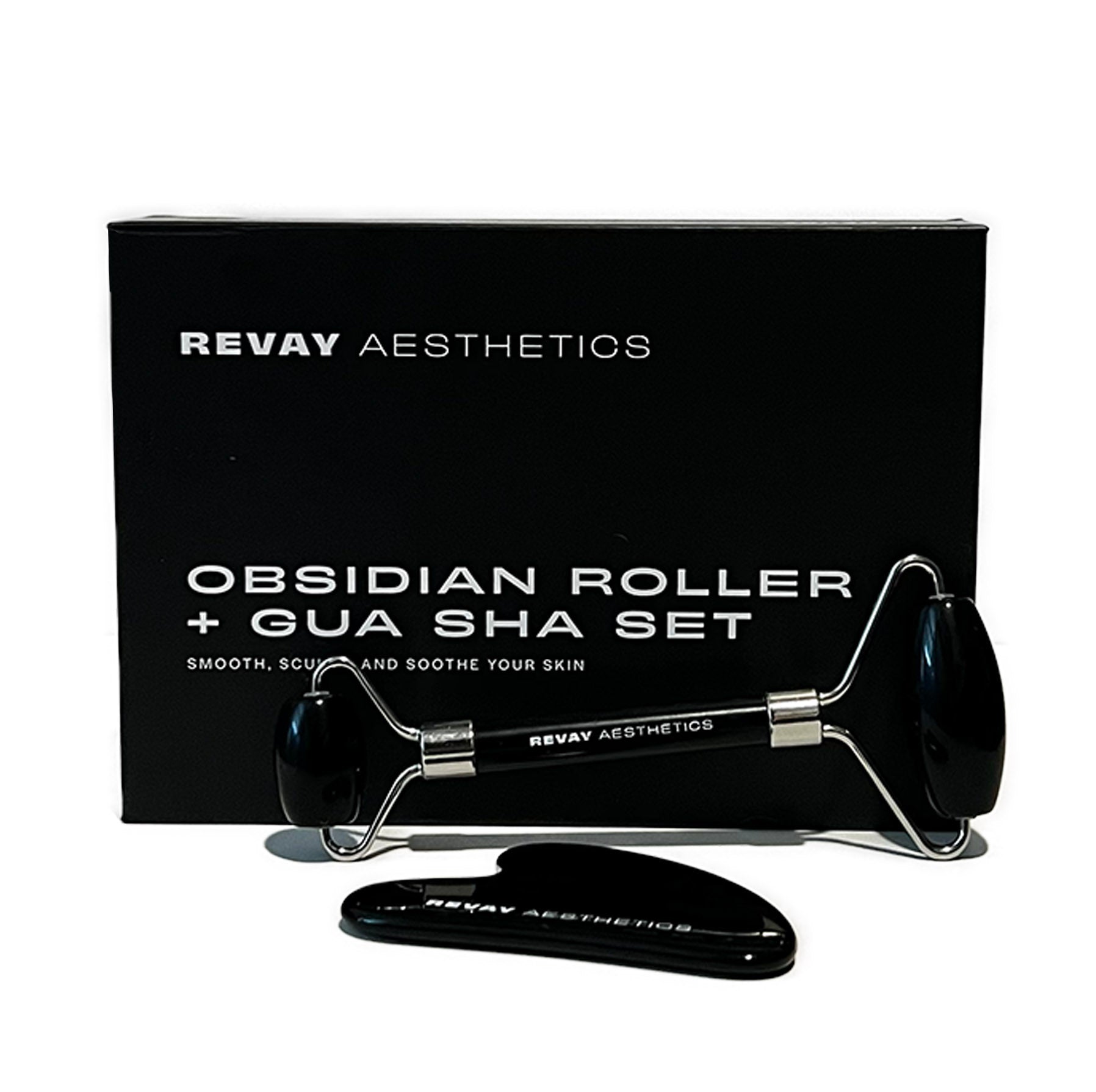 black obsidian gua sha and roller product shot flat lay