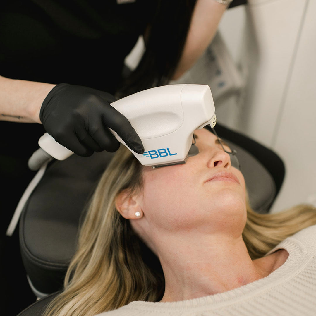 women receiving broad band light treatment 