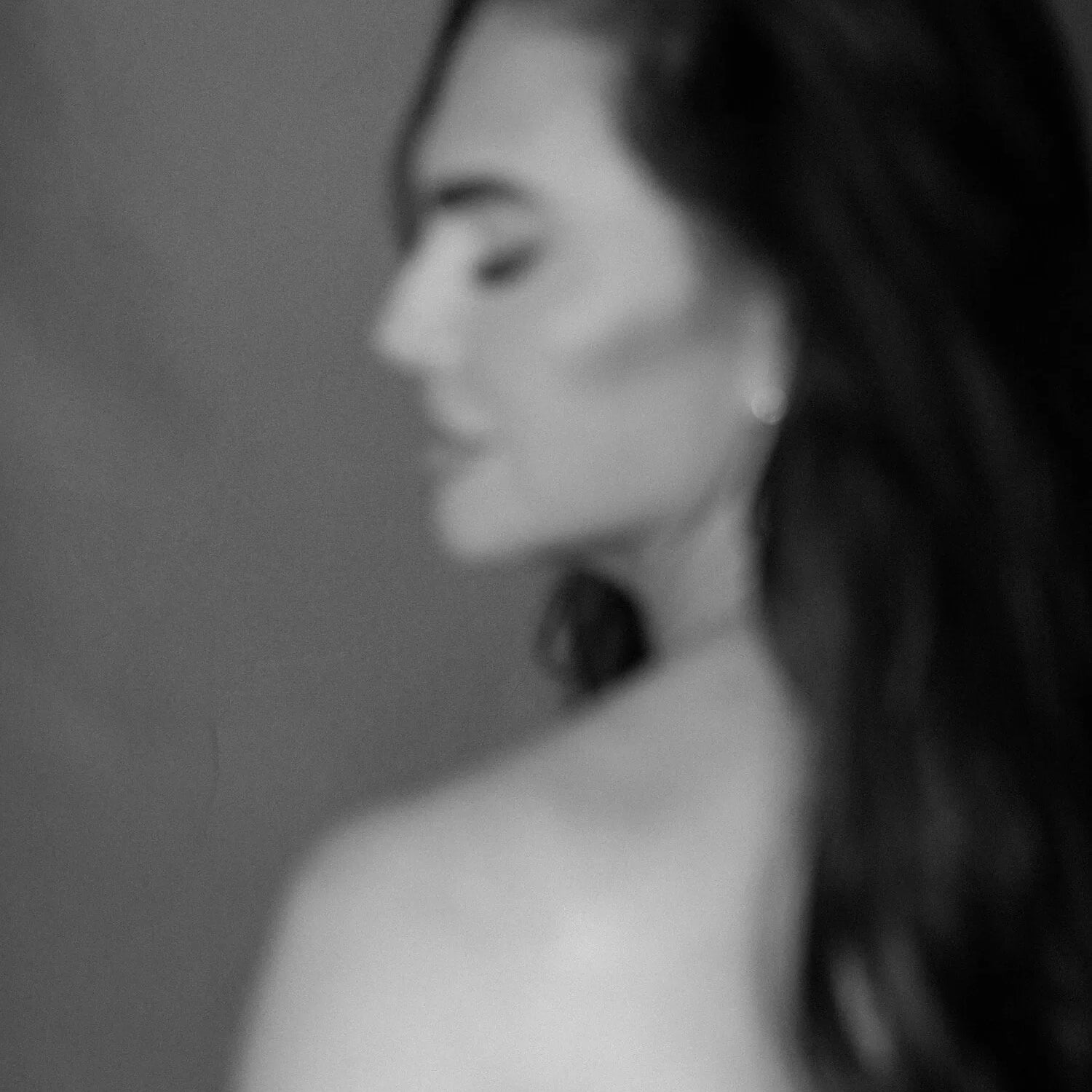 Soft-focus black-and-white portrait of a woman