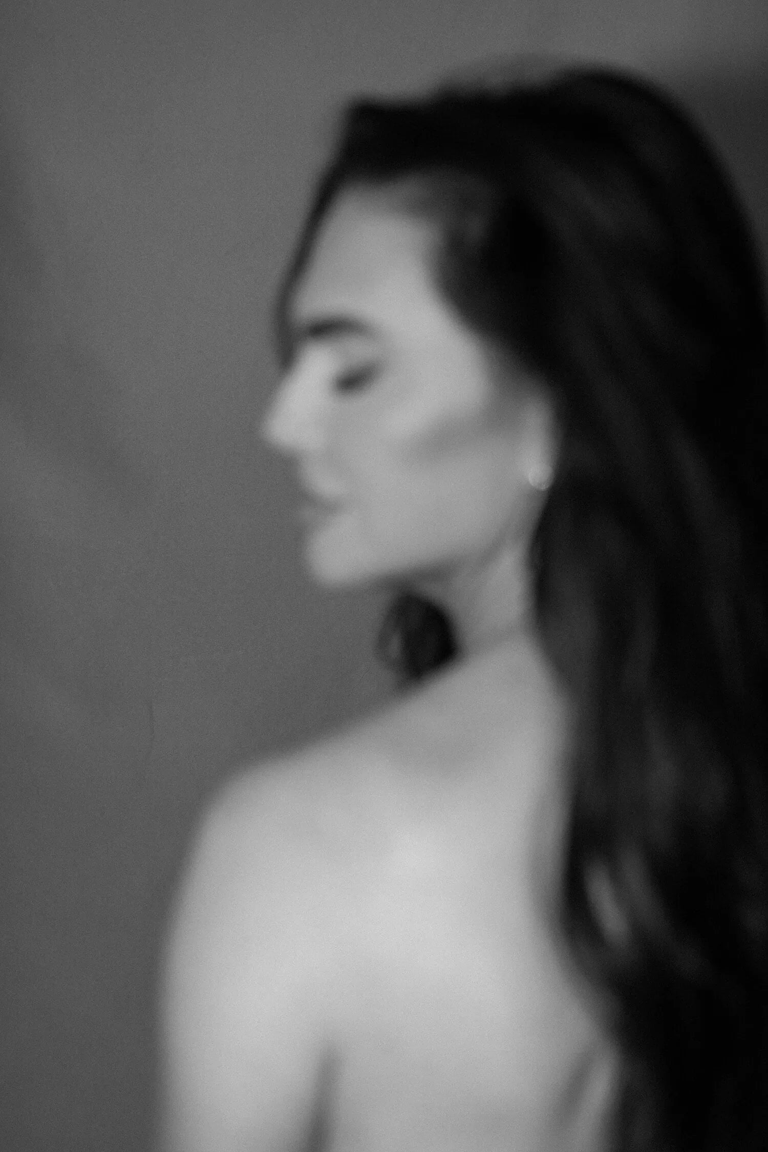 Soft-focus black-and-white portrait of a woman