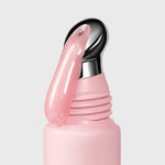 close-up of AN-GLOSS Ceramide Angel Food Lip Tint coming out of the tube