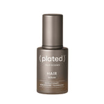 bottle of plated hair serum