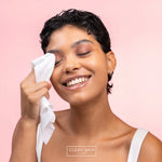 woman using Clean Skin Club Wipes on eyes