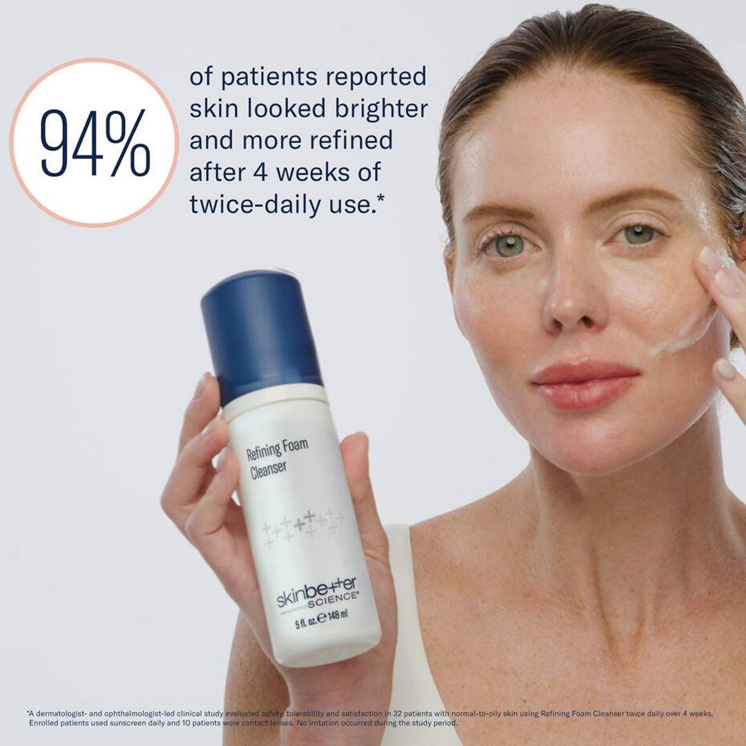 woman holding Skinbetter Refining Foam Cleanser