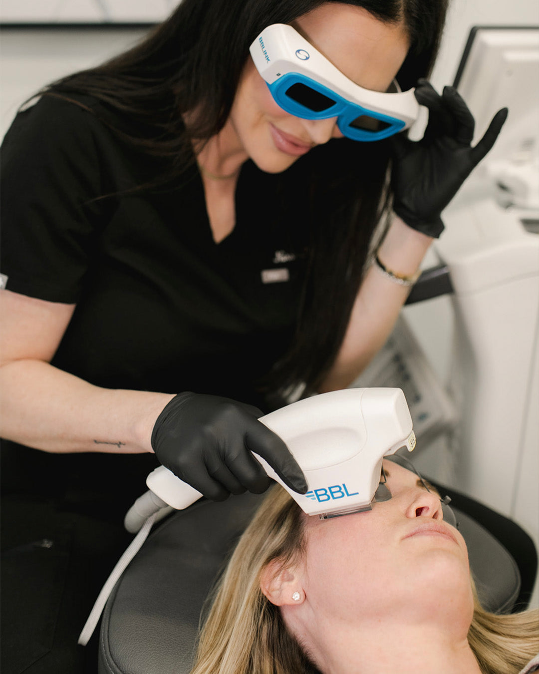 woman receiving bbl laser treatment from Revay Aesthetics