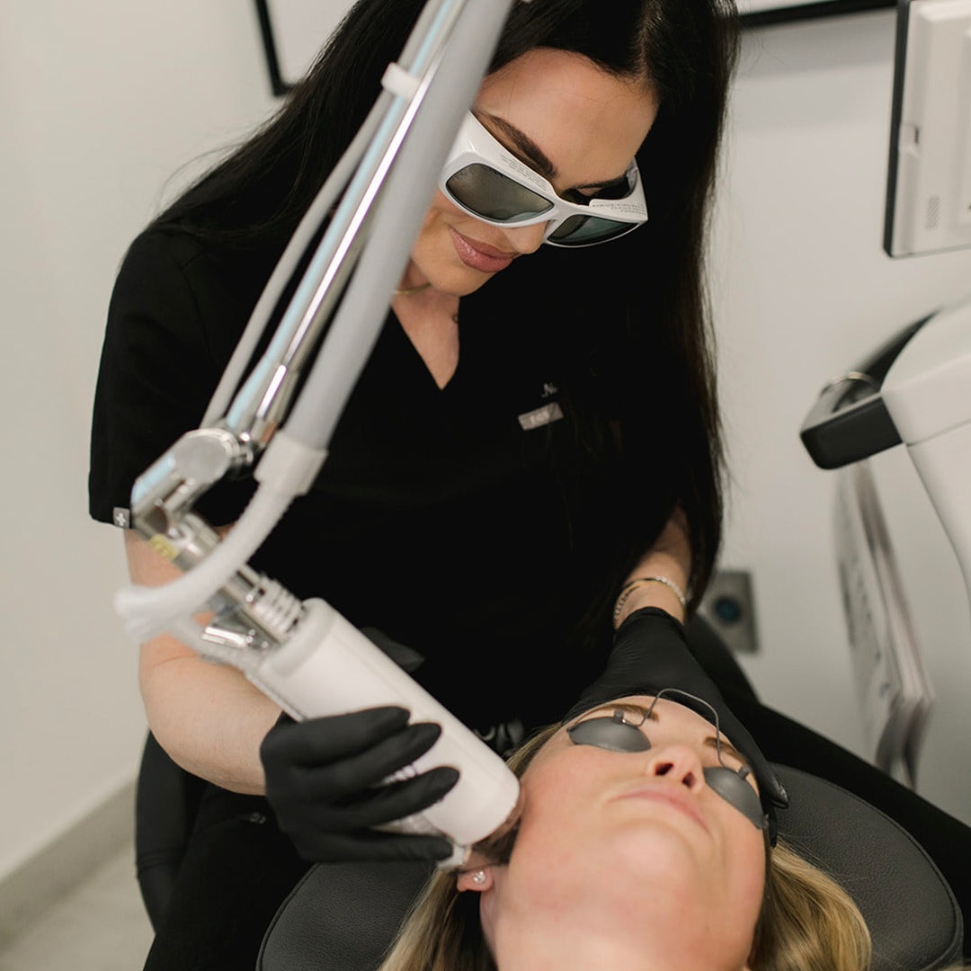 woman receiving halo laser treatment from Revay Aesthetics