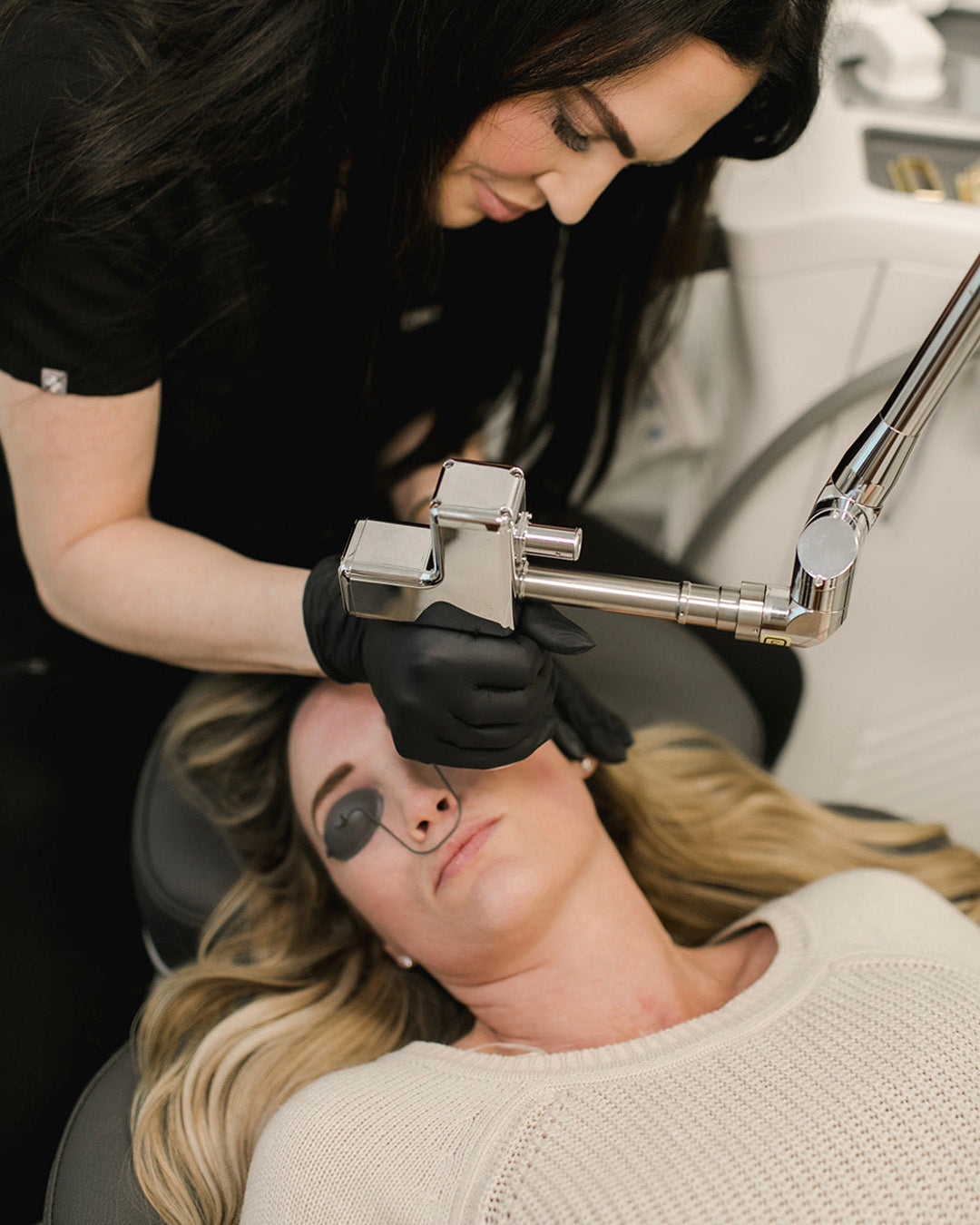 woman receiving nano laser peel ablative treatment at revay aesthetics